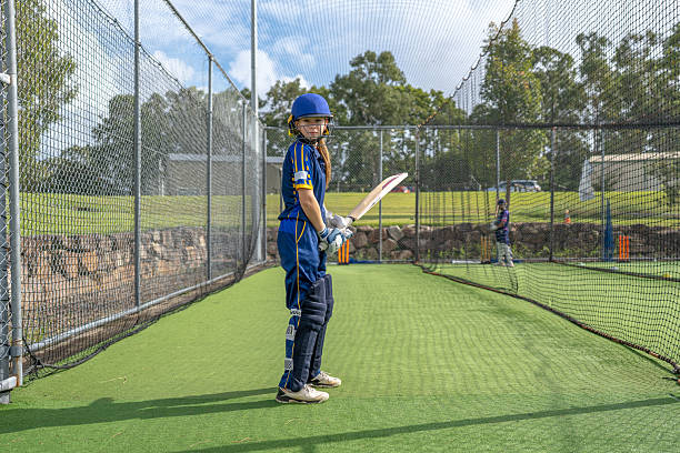 istock Young Female Cricket Player 2212071664