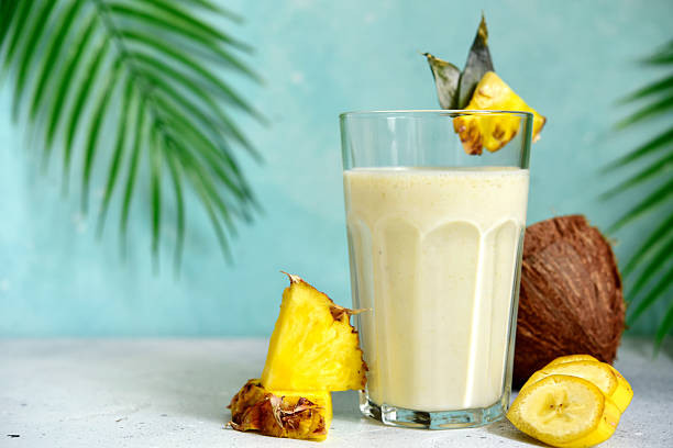 istock Delicious tropical smoothie with pineapple, coconut and banana. 2212072877