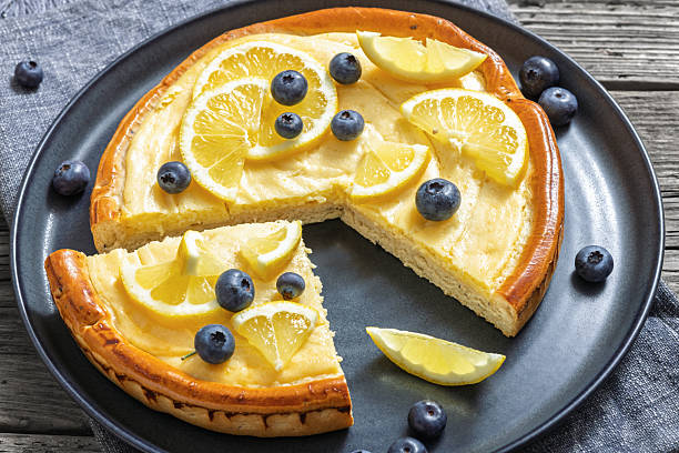 istock Cheesecake with blueberries sliced on a plate 2212079610