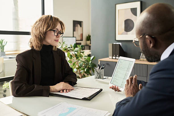istock Business Colleagues Discussing Financial Online Report 2212080154
