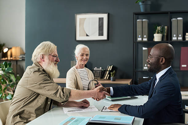 istock Business Handshake With Senior Man 2212080563