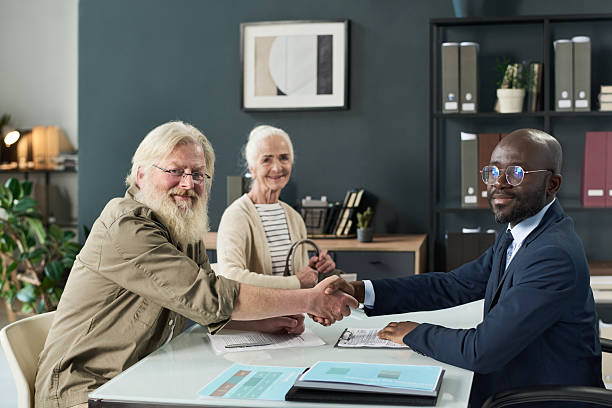 istock Businessman And Customer Shaking Hands 2212080570