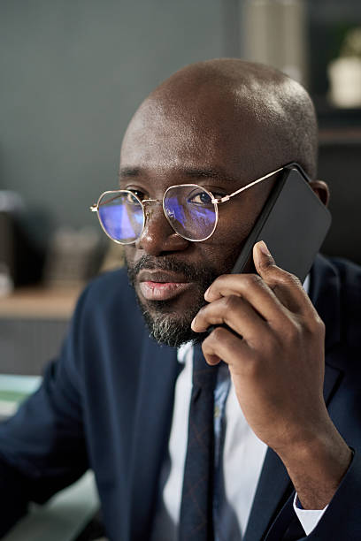 istock Businessman Talking On Mobile Phone 2212080613