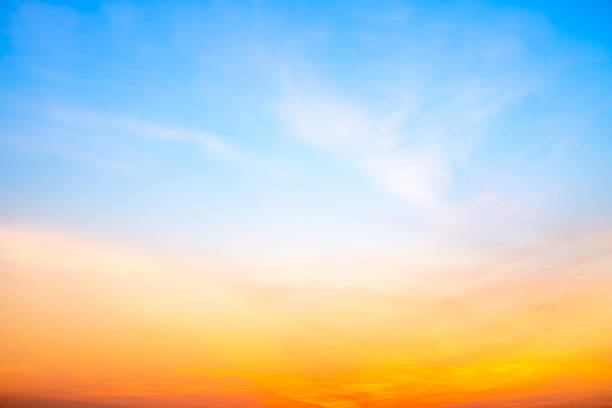 istock Beautiful , luxury soft gradient orange gold clouds and sunlight on the blue sky perfect for the background, take in evening,Twilight, Large size, high definition landscape photo 2212080842