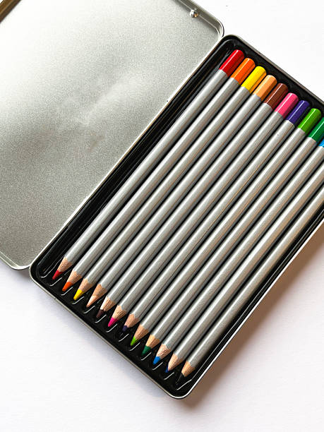 istock Box of color pencils on white background, top view 2212083537