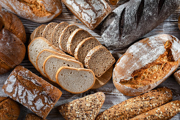 istock Assorted bakery products including loaves of bread and rolls 2212084487