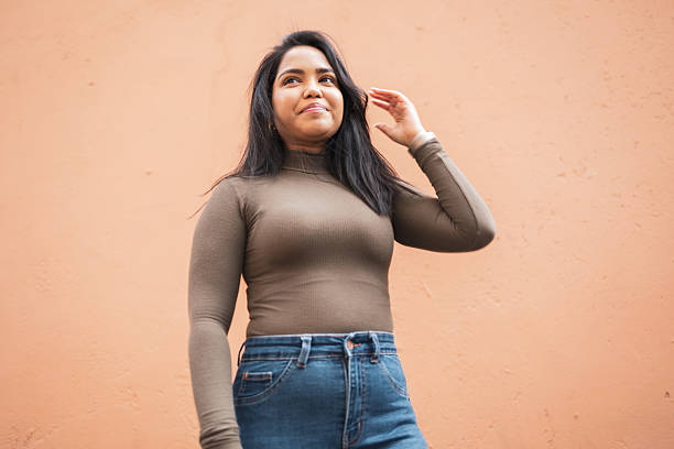 istock Portrait of a confident young woman with a cheerful expression 2212085621