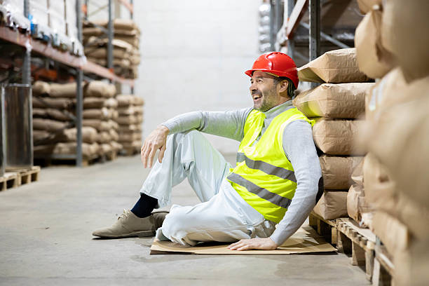 istock Worker Takes a Break in Warehouse 2212096275