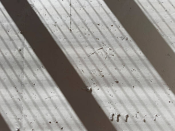 istock Photographic documentation of shadows on concrete wall 2212096299