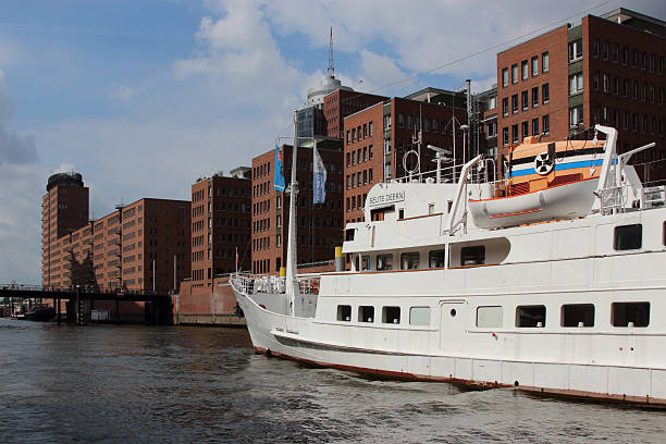 Hamburg - Hamburg - Warehouse district with boat in front, Germany - August 07, 2017