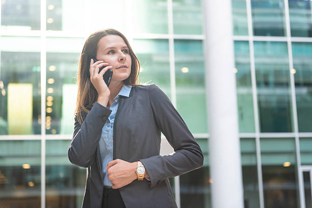 istock City professional woman having a phone call 2212102711