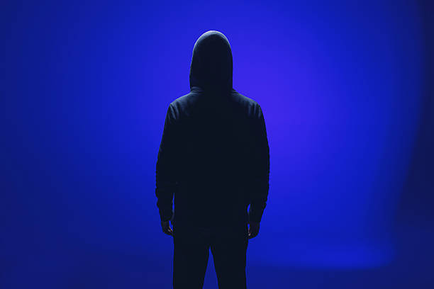 istock Silhouette of man on blue background 2212109679