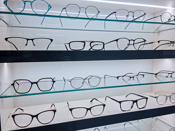 istock View of eyeglass display shelves at store 2212114532