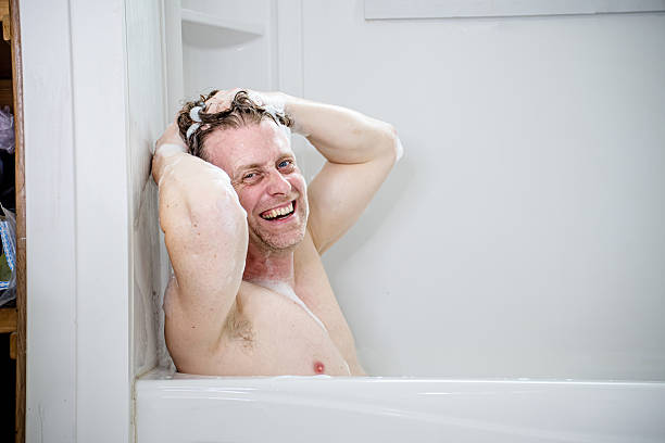 istock Autistic Man Enjoys Sensory Self-Care in Bath 2212115133
