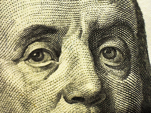 istock Macro close up of Ben Franklin's face on the US 100 dollar bill. 2212121143