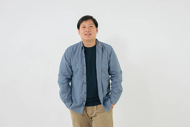 istock Portrait of friendly young man 2212123310
