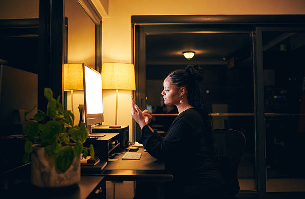 Focused Woman Working Late at Night