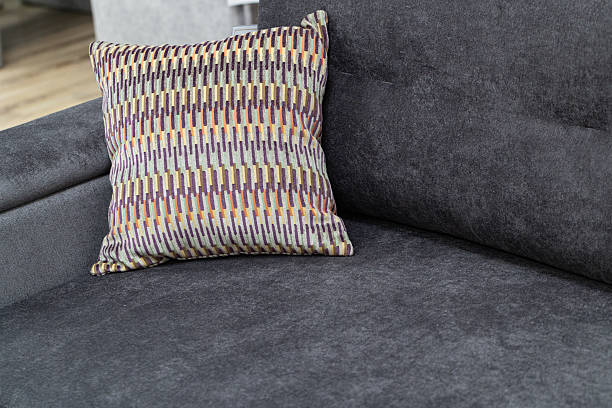 istock Closeup of sofa with cushions 2212126238