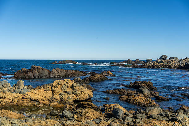istock Rocky Shoreline and Blue Ocean at Pichidangui, Chile 2212127802
