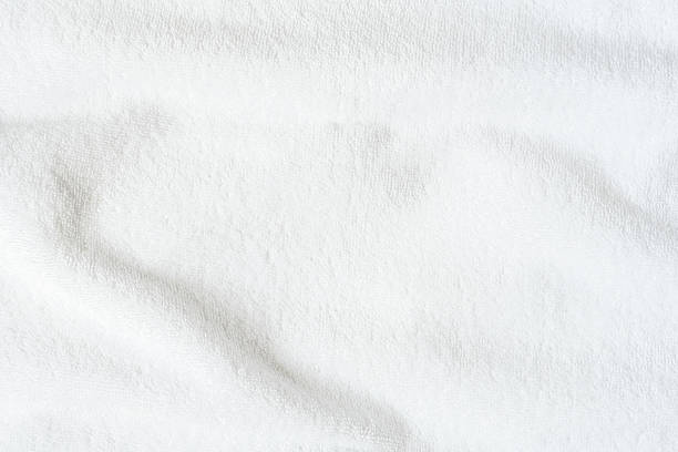 istock White towel texture background or beach bath fabric, kitchen wiper towel or plain blank cloth bathroom rug made of soft clean cotton fiber material for linen laundry backdrop 2212153166