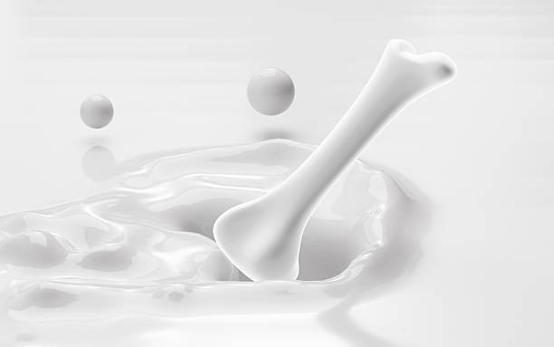 istock Flowing milk is a bone shape, milk calcium concept, 3d rendering. 2212158875