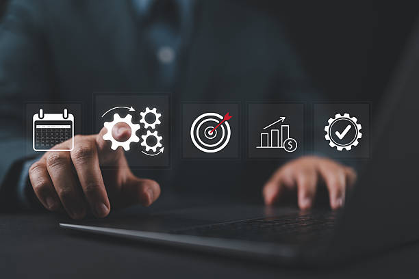 istock Automation concept. Businessman use laptop with virtual operations management technology related to business processes and workflows, high performance, monitoring and evaluation. 2212160198