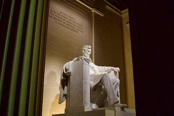 istock Abraham Lincoln Memorial at Night Side Profile Between Columns 2212175899