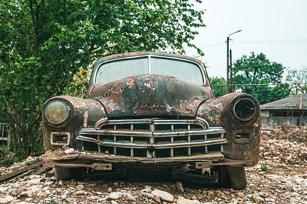 istock Old rusty car. Abandoned retro vintage car from the 60s 2212177980