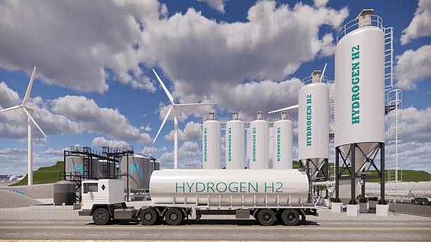 istock 3D rendering Factory Green Hydrogen Tank construction site.Renewable Clean Gas Storage Tanks of Hydrogen .Net zero concept. 2212178218