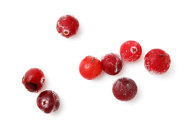 istock A bunch of red berries with a white background 2212180644