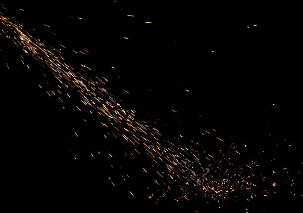 istock A black background with a long, thin line of sparks 2212180659