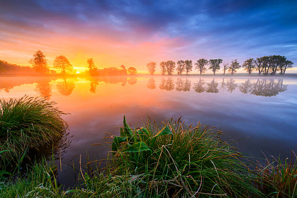 Colorful spring sunrise over the lake