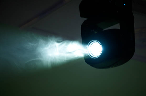 istock A spotlight is shining on a smokey background 2212180697