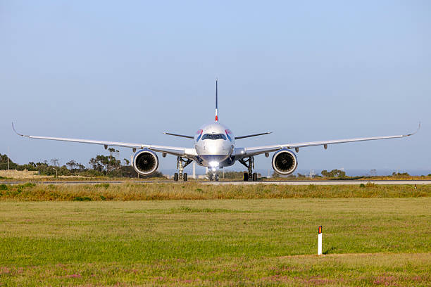 Luqa, Malta - April 24, 2025: British Airways Airbus A350-1041 (REG: G-XWBJ) departing after having been serviced at LTM.