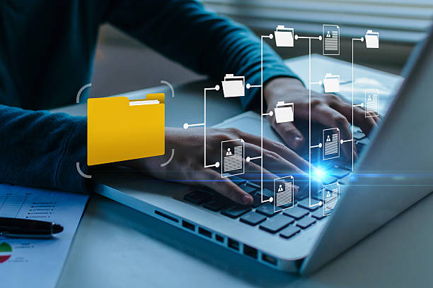 istock business people working document management system on laptop computer with graphic icon diagram on desk, digital marketing, cloud computing, business finance, internet network technology concept 2212190508