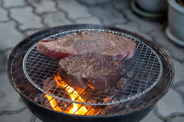 istock Meat on the charcoal grill 2212190623