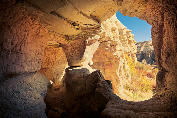Picturesque mountain landscape with unique rock formations. View from ancient cave house. Cappadocia, Central Anatolia, Turkey