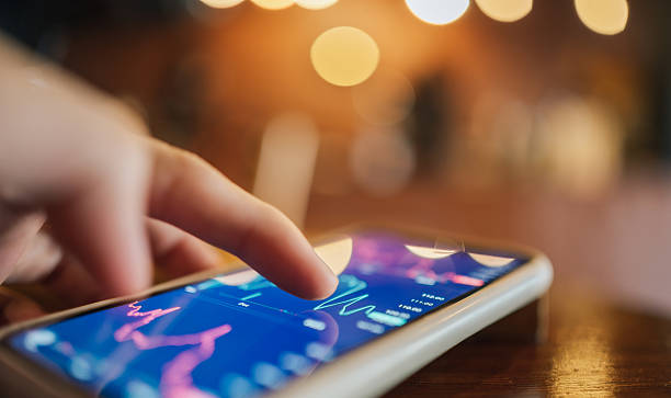 istock Millennial and Gen Z woman’s hands navigating her smartphone focused perspective emphasize interaction with cutting-edge financial tools such as cryptocurrency trading or blockchain applications on mobile 2212194479