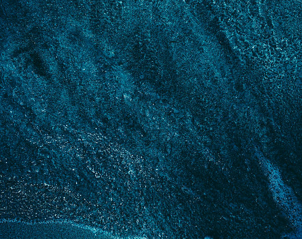 istock dark sea water, top view, close up 2212195307