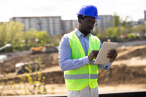 istock Confident African American professional leading construction works 2212199116