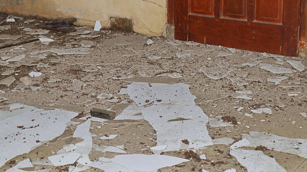 istock Damaged gypsum ceiling of the house 2212200728