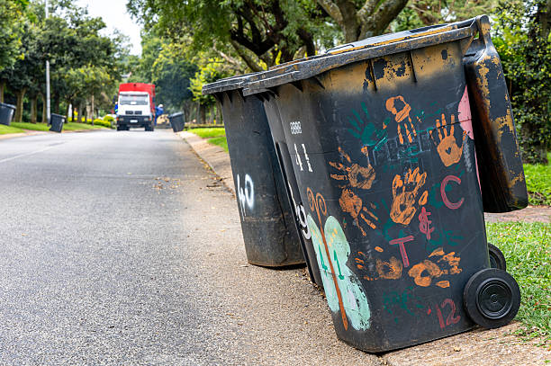 istock Wheeled garbage bins on a suburban street 2212202568