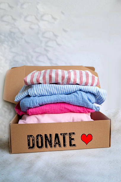 istock Donation box with donation clothes for a charity 2212203833