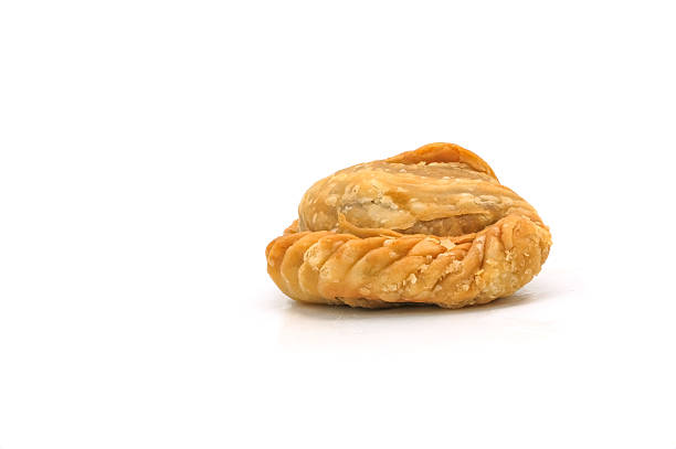 istock curry puff pastry isolated on white background. Snacks in Thailand. Bean Paste Pastries 2212205179