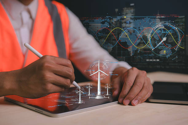 istock Engineer or man using tablet and pen working on virtual wind turbine diagram for Reduce CO2 emissions and carbon footprint, global warming climate change. Sustainable development and green energy 2212208118