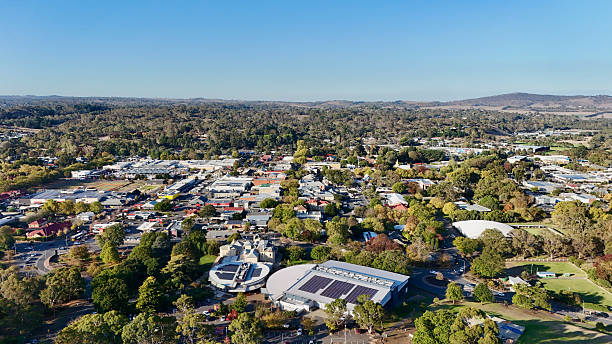 istock Mount Barker, South Australia – Aerial Drone Image Featuring Town Center, Urban Development, Tree-Lined Streets, Rolling Hills, and Green Spaces in the Heart of the Adelaide Hills Region 2212208280