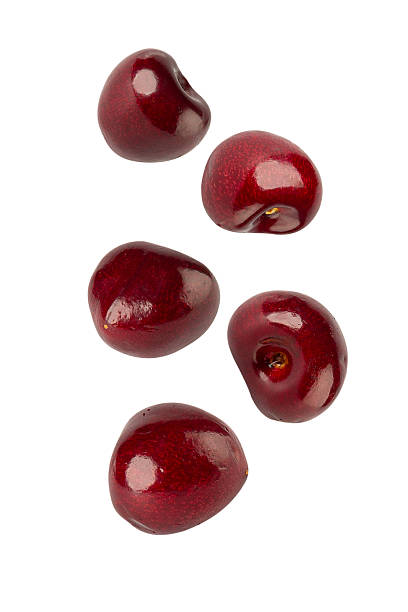 istock Falling Cherry isolated on white background with clipping path, full depth of field 2212211937
