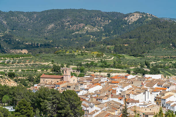 istock Panoramic landscape with a village on background. 2212214547