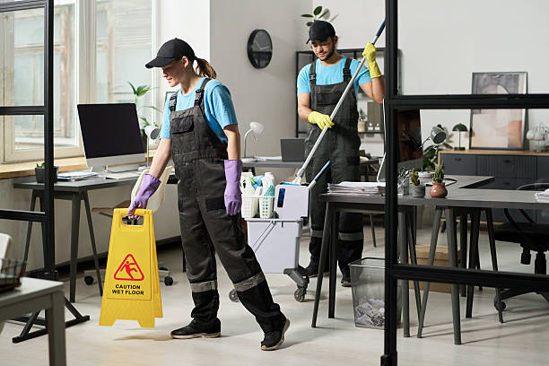 istock Cleaners Cleaning Office In Team 2212214697