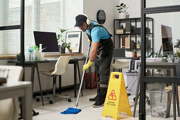 istock Man Cleaning Floor In Office 2212214834
